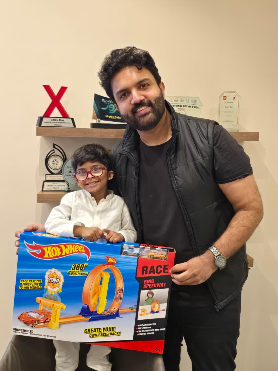 Health Warriors representative with a child during the eye health support case